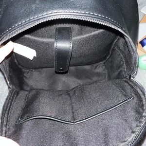 Black leather backpack purse
